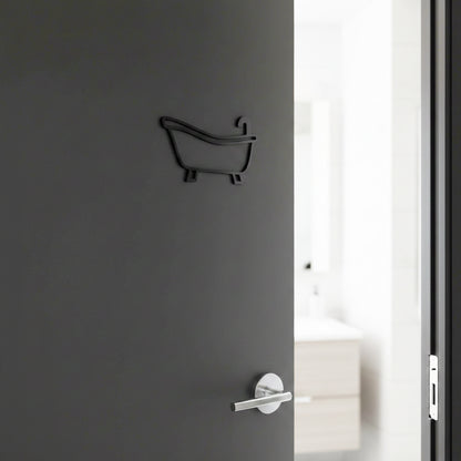 Gray door with a bathtub-shaped key holder and a silver handle.