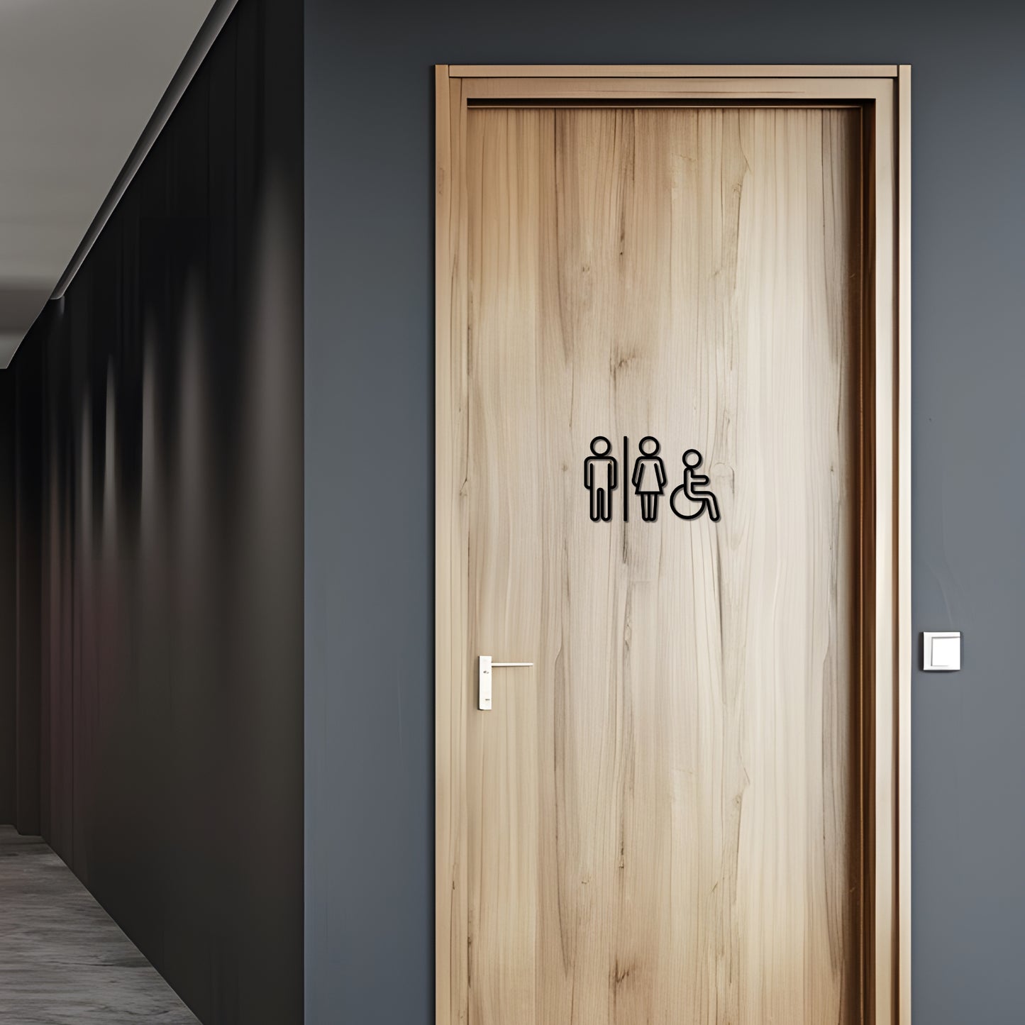 Wooden door with accessibility icon decal in a hallway
