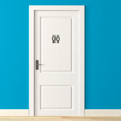 White door with gender symbols on a blue wall