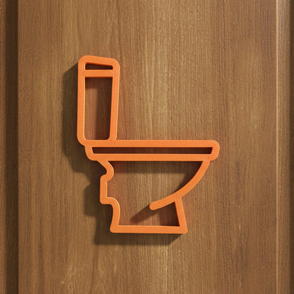 Orange toilet door sign on a wooden door