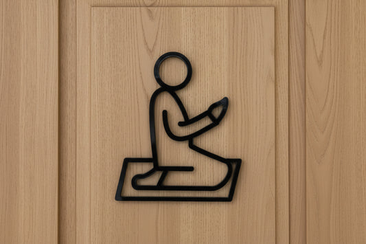 Praying man sign on the wooden door